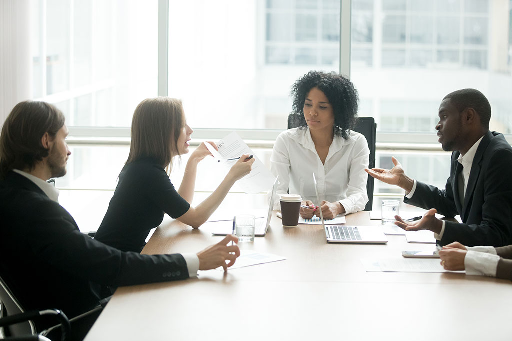 a team of business executives in a meeting